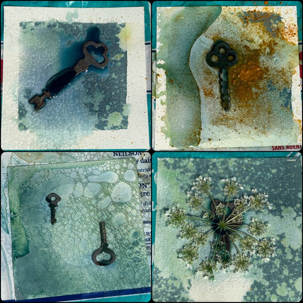 The wet cyanotypes with keys show swirls of blue and green and splotches of rusty orange on the various squares.