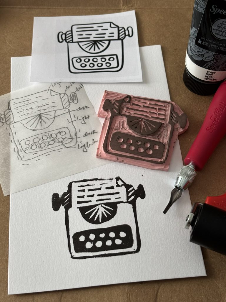 The drawing, carving and printing of an image of a retro manual typewriter