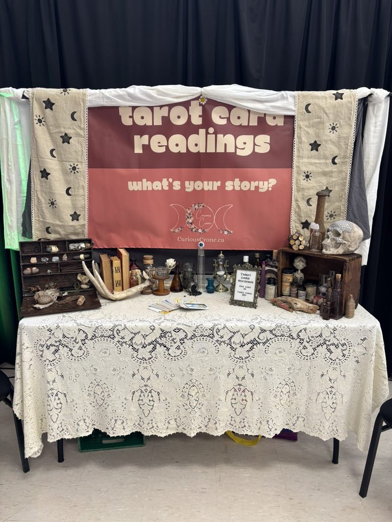 tarot reading booth decorated for a pop up renaissance fair 